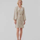 Short dress with print and long puff sleeves. ChrissyMD print dress is made with a v-neckline, closed by buttons in front, and tiebelt at the waist.