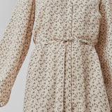 Short dress with print and long puff sleeves. ChrissyMD print dress is made with a v-neckline, closed by buttons in front, and tiebelt at the waist.