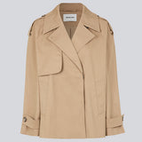 Short trench coat in a cotton quality with concealed buttons down the front. Clara jacket has an oversized silhouette and classic details. Lined.  The model is 177 cm and wears a size S/36.Short trench coat in a cotton quality with concealed buttons down the front. Clara jacket has an oversized silhouette and classic details. Lined.