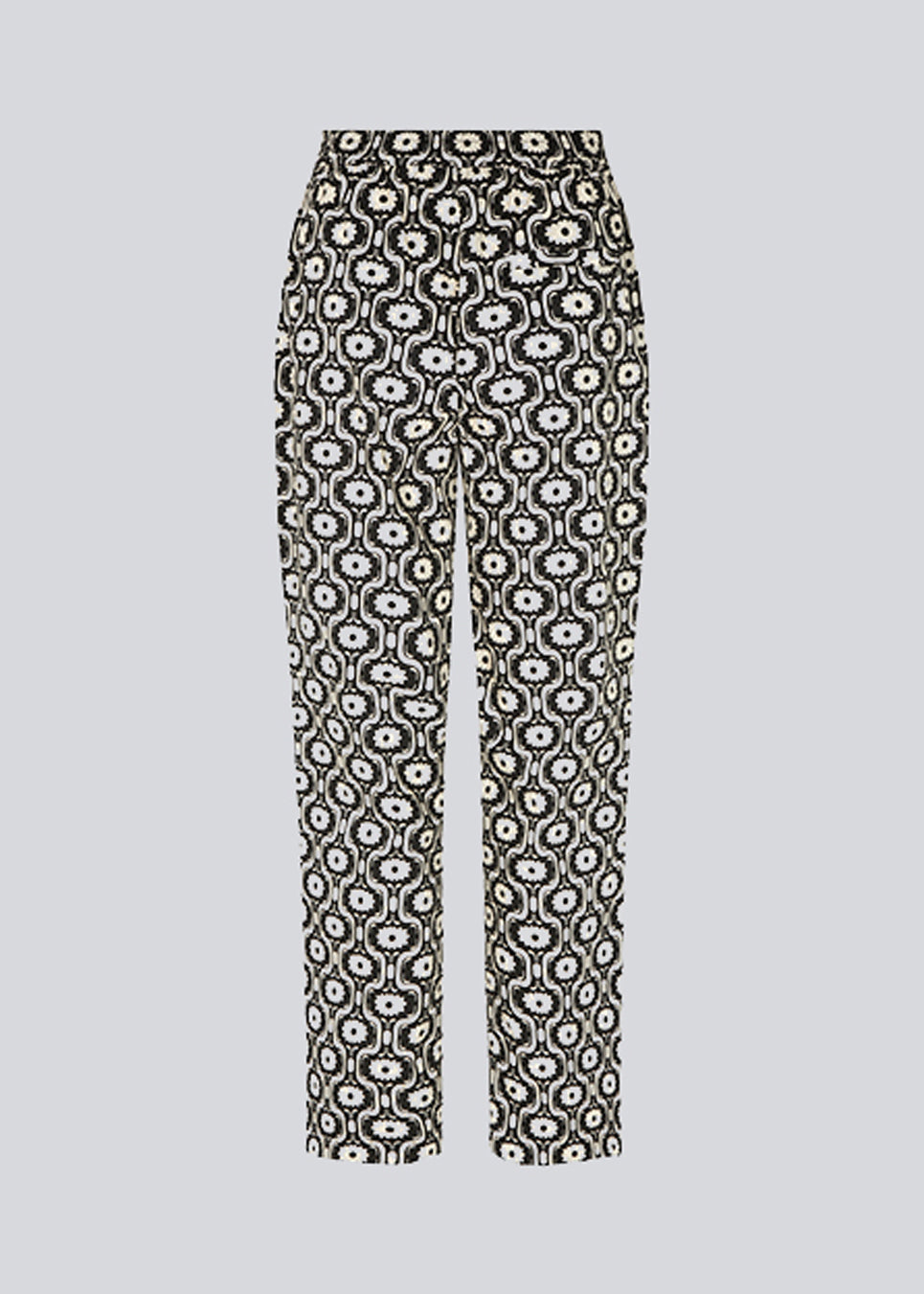 Easy-fitting pants in organic cotton and print. CoraMD print pants have straight legs and a medium waist with covered elasticated. The model is 174 cm and wears a size S/36.