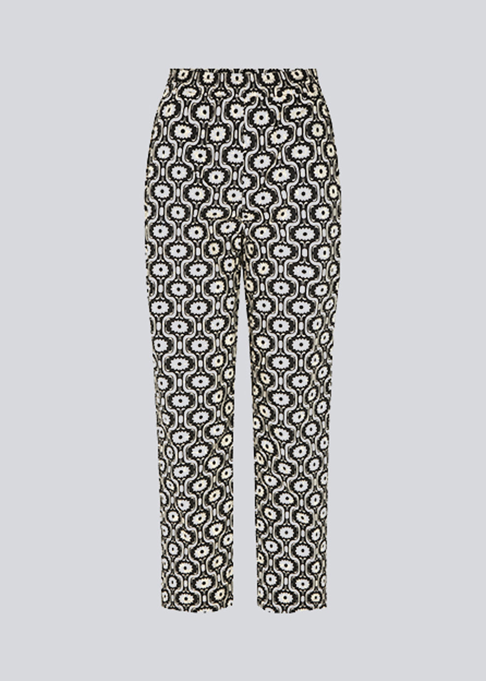 Easy-fitting pants in organic cotton and print. CoraMD print pants have straight legs and a medium waist with covered elasticated. The model is 174 cm and wears a size S/36.