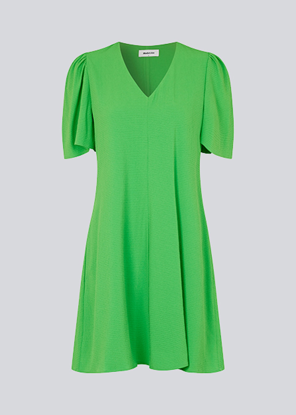 Summer dress with short puff sleeves and v-shaped neckline. CorbaMD dress has a short and full skirt. Lined.