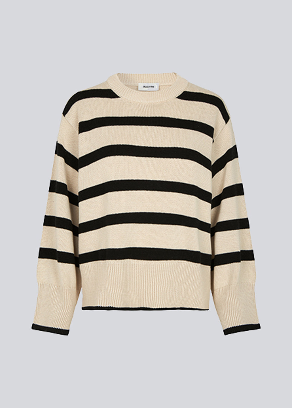 Fine-knitted oversized jumper knitted from cotton with black stripes. CorbinMD stripe o-neck has a ribbed round neckline, long wide sleeves, and wide ribbing at cuffs and hem.