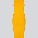 Tight fitted basic yellow dress in organic cotton jersey. DaeMD dress is sleeveless with a high and straight neckline. The dress cuts below the knees. The model is 177 cm and wears a size S/36.
