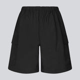 Cargo shorts in black in nylon with wide legs. DilaraMD shorts have an elasticated waistband and two large patch pockets on the sides. The model is 177 cm and wears a size S/36.