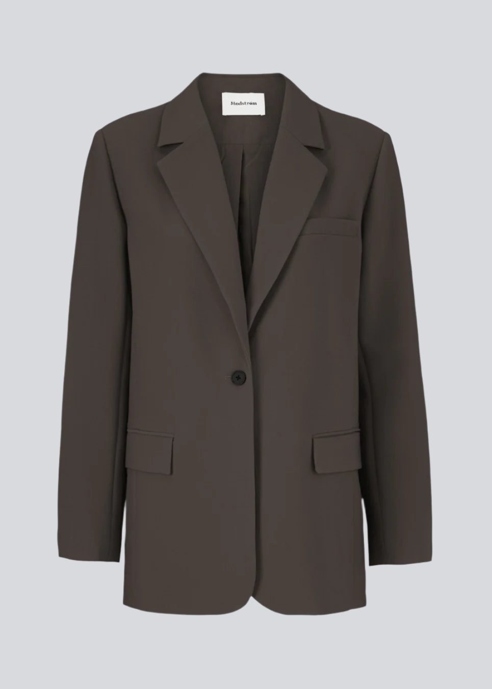 Gale blazer in dark brown has a classic and elegant design, fulfilled by the beautiful revers collar and a long fit. The blazer has a button closure at the front and a chest pocket on the left side.  Buy matching pants: Gale straight pants or Gale Pants in the same color to complete the look. 