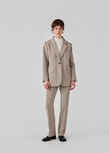 Gale blazer has a classic and elegant design, fulfilled by the beautiful revers collar and a long fit. The blazer has a button closure at the front and a chest pocket on the left side. This blazer has a spacious fit. We recommend sizing down. The model is 177 cm and wears a size S/36.  Buy the matching pants: Gale pants, in the same color, to complete the look.