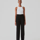 Gale pants in Black have a classic design. The pants have straight, wide legs with pressfolds, which creates an elegant look. Buy Gale Blazer or GaleMD straight blazer in the same color that fits the pants. These pants have a spacious fit. We recommend sizing down.  The model is 177 cm and wears a size S/36.