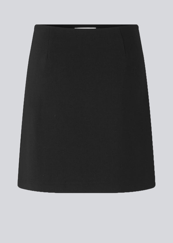 Classic A-line skirt in short length. GaleMD skirt has a simple expression with a hidden zip at side seam and slit in front.  Buy Gale blazer in the same color that fits the skirt.