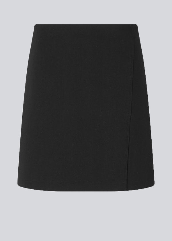 Classic A-line skirt in short length. GaleMD skirt has a simple expression with a hidden zip at side seam and slit in front.  Buy Gale blazer in the same color that fits the skirt.