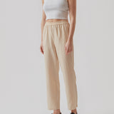 Basic top cut from a soft ribbed jersey fabric. IgorMD crop top in the color Off White is styled with a slim fit and cropped fit with racer-shaped back. Perfect for a sporty look. The model is 173 cm and wears a size S/36