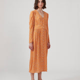 Long dress with puff sleeves and floral print in EcoVero viscose. CorinnaMD print dress is designed with buttons in front and a pretty detail at the waist.