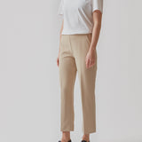 Classic pants with creases and straight, cropped legs. NelliMD cropped pants have a hidden zipper at the side and a covered elastic at the waist for a more comfortable fit. The model is 173 cm and wears a size S/36