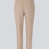 Classic pants with creases and straight, cropped legs. NelliMD cropped pants have a hidden zipper at the side and a covered elastic at the waist for a more comfortable fit. The model is 173 cm and wears a size S/36