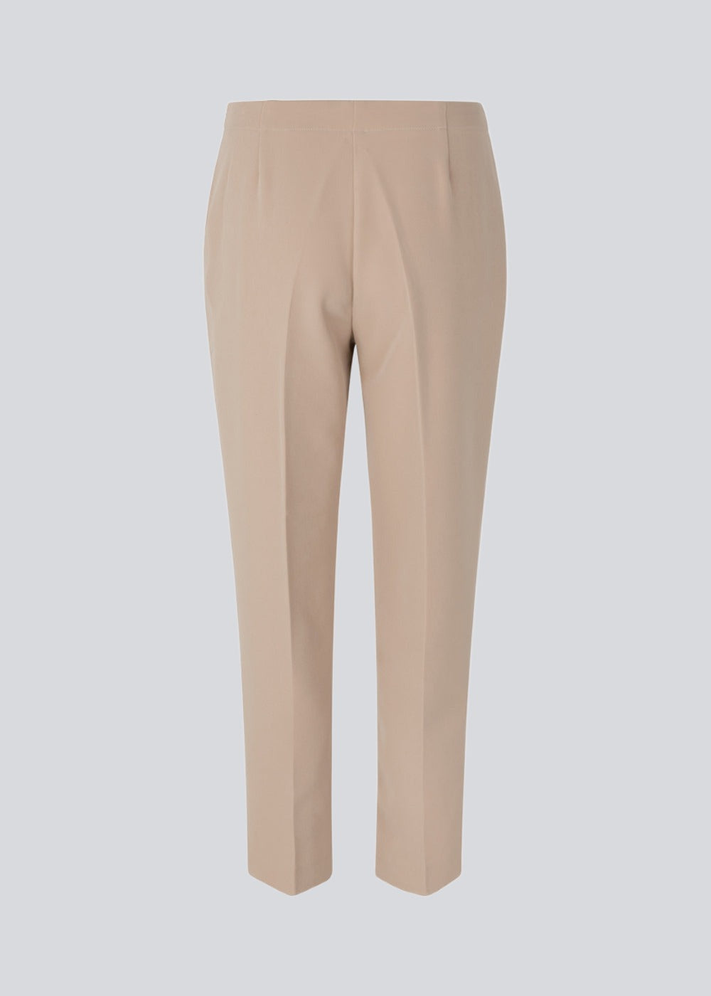Classic pants with creases and straight, cropped legs. NelliMD cropped pants have a hidden zipper at the side and a covered elastic at the waist for a more comfortable fit. The model is 173 cm and wears a size S/36
