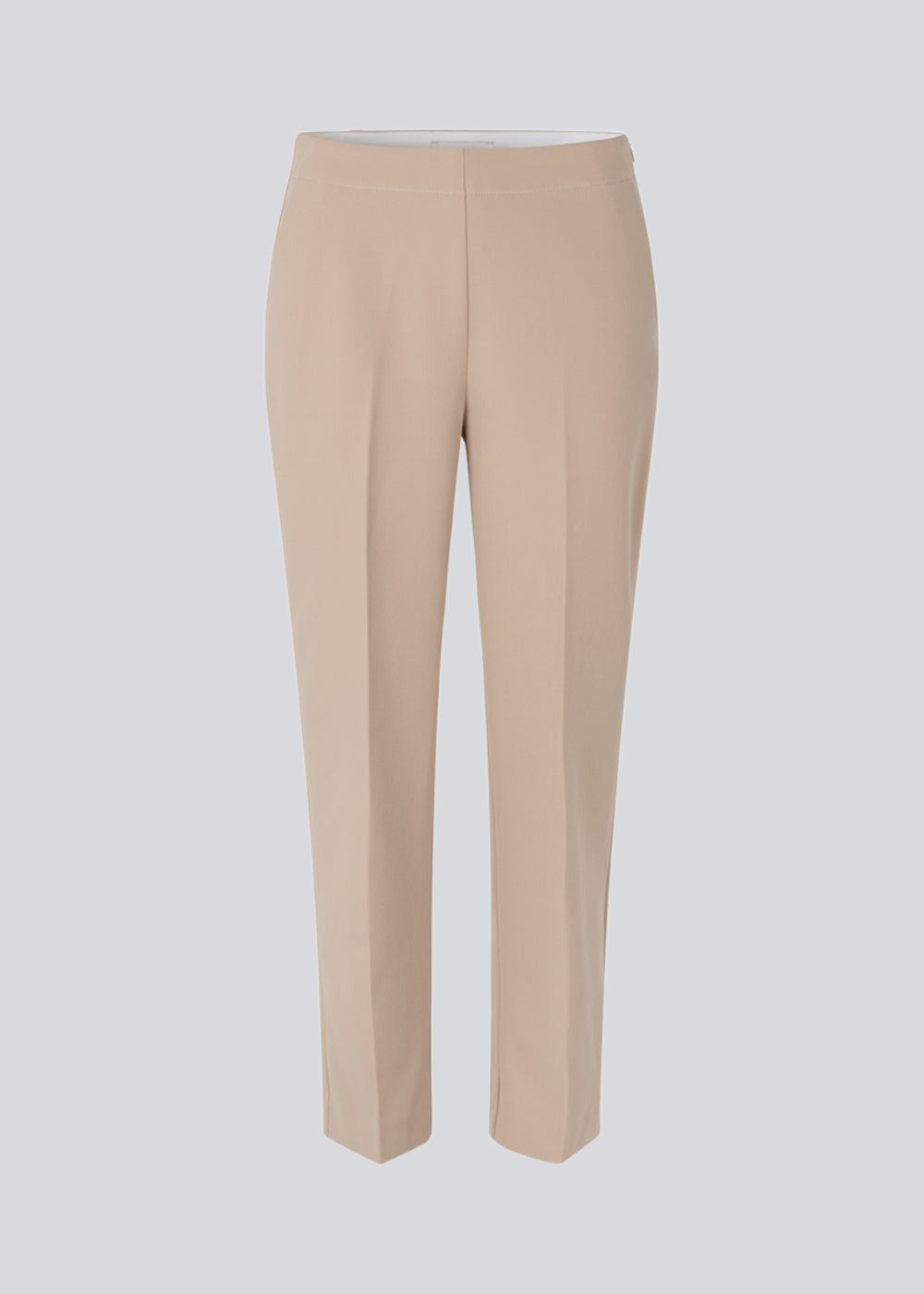 Classic pants with creases and straight, cropped legs. NelliMD cropped pants have a hidden zipper at the side and a covered elastic at the waist for a more comfortable fit. The model is 173 cm and wears a size S/36