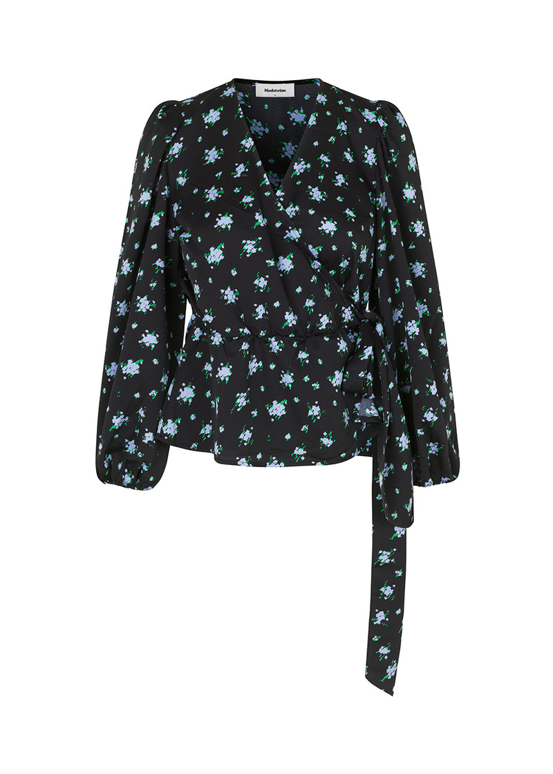 Pretty wrap top in a responsible quality. Ness print top has long balloon sleeves with puffed shoulders, a beautiful flower print, and a wide belt at the waist. The model is 173 cm and wears a size S/36