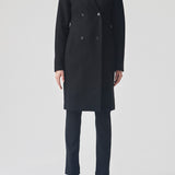 Beautiful, knee-length wool coat in black. Odelia coat is closed at front by 4 buttons and is fitted around the waist, which gives a feminine look. Because of the high content of wool the jacket will be perfect for fall and the mild winters.