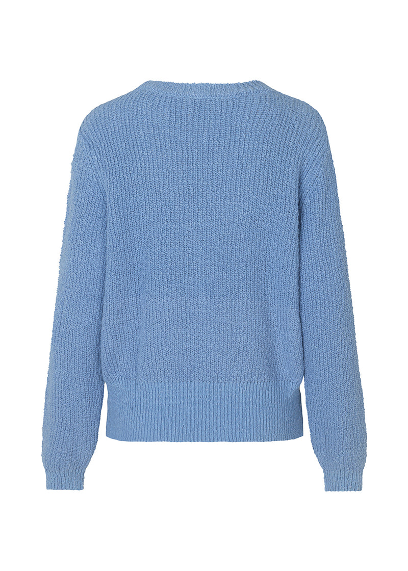 Omen o-neck is a classic sweater in a breezy cotton quality.The fit is relaxed with a round neckline and long sleeves. Ribbed trimmings at neck, sleeves and body.