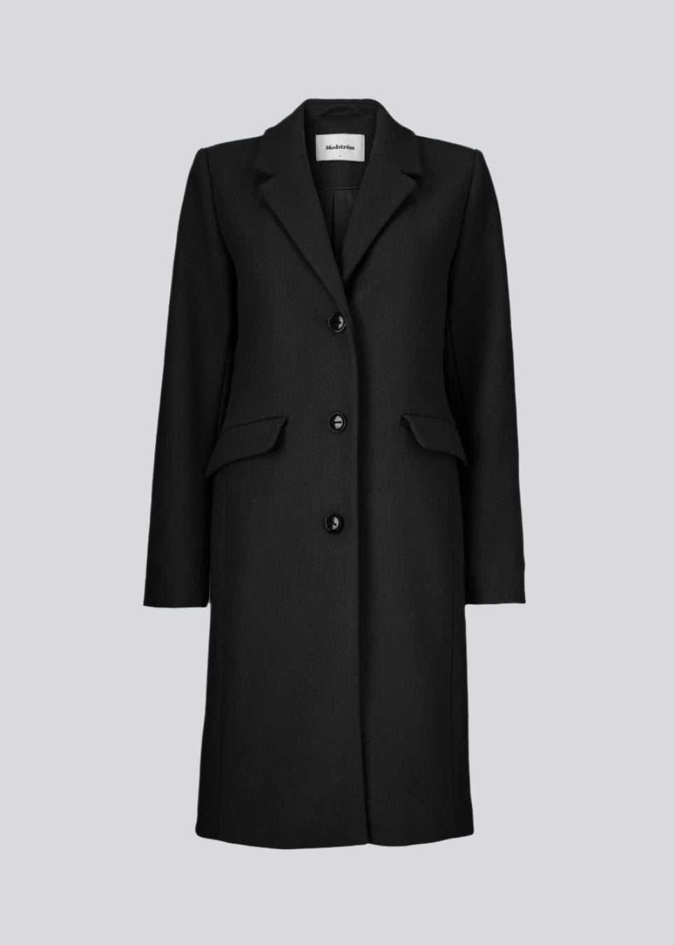 Beautiful, long wool coat in black. Pamela coat is closed by 3 big buttons at front and is waisted, which gives a feminine look. Because of the high content of wool you will be able to keep warm all through fall and the mild winters.