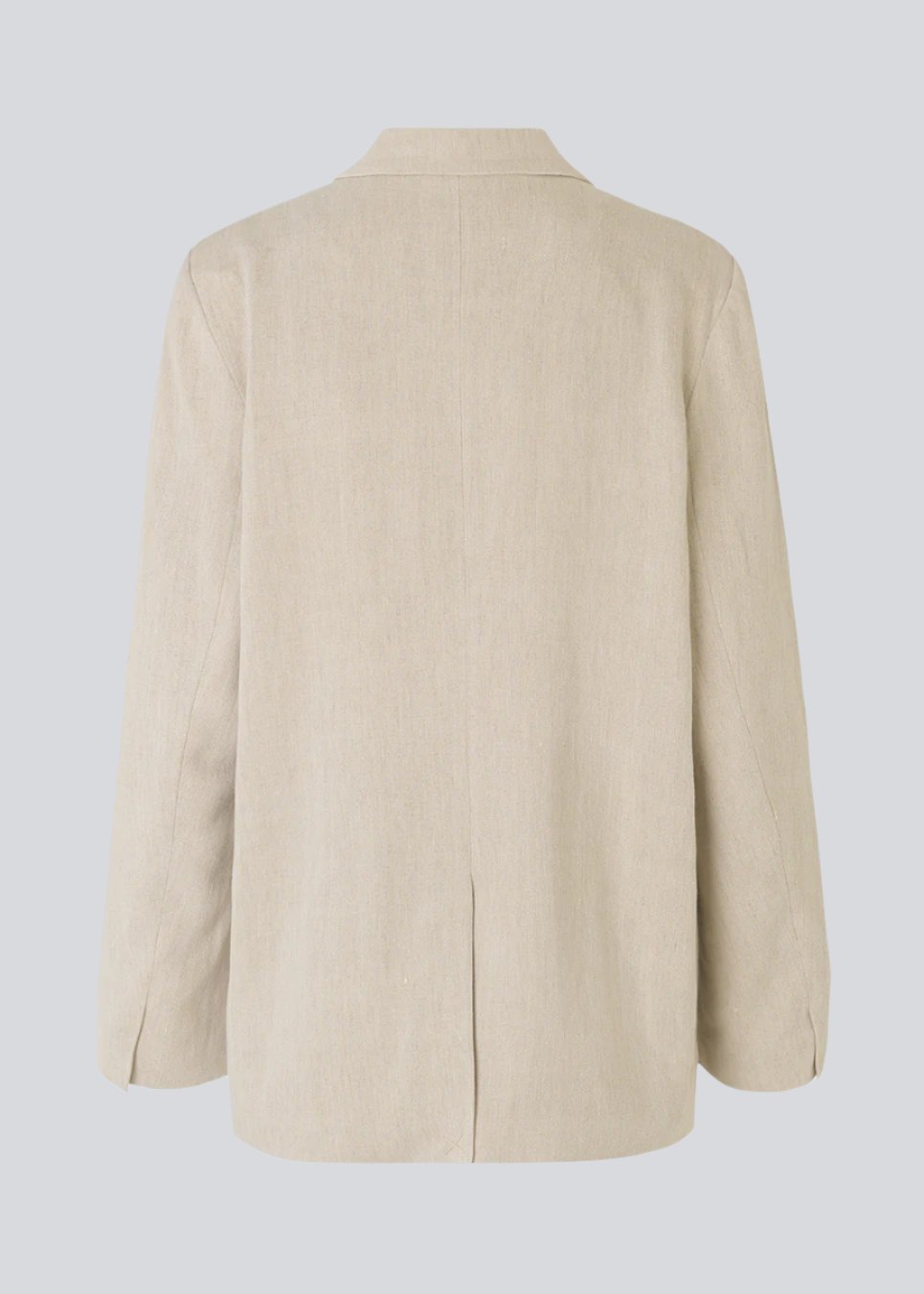 Blazer in a voluminous fit with an asymmetrical look. Park blazer in Cream Milk is made from an airy linen quality, which is easy to style with the matching pants or over a dress on a summer evening.