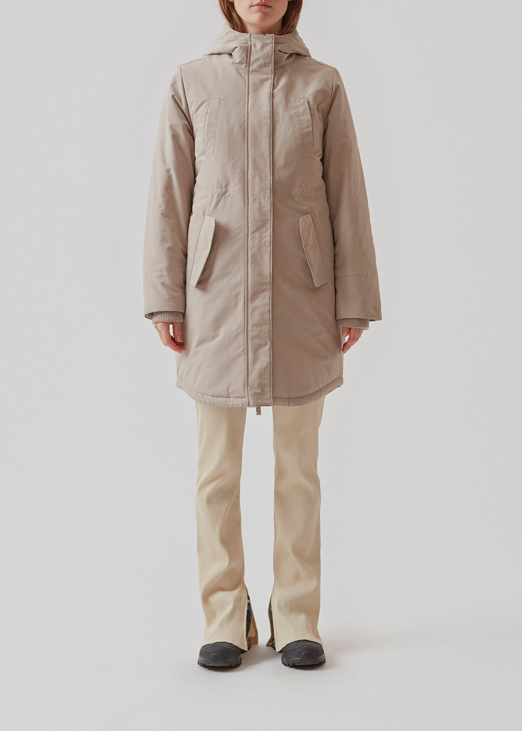 Nice water-repellent winter jacket in beige. Patricia coat is with a hood and has a hidden zipper closure at the front and 4 pockets. The jacket has M3 Thinsulate padding, which is a world recognized for its high insulation. This makes the jacket the perfect choice for the cold winters.