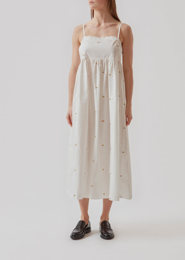 Airy sleeveless dress in organic cotton. PernilleMD strap dress has small, adjustable straps, a more form-fitted bust, and a voluminous, softly draped skirt.