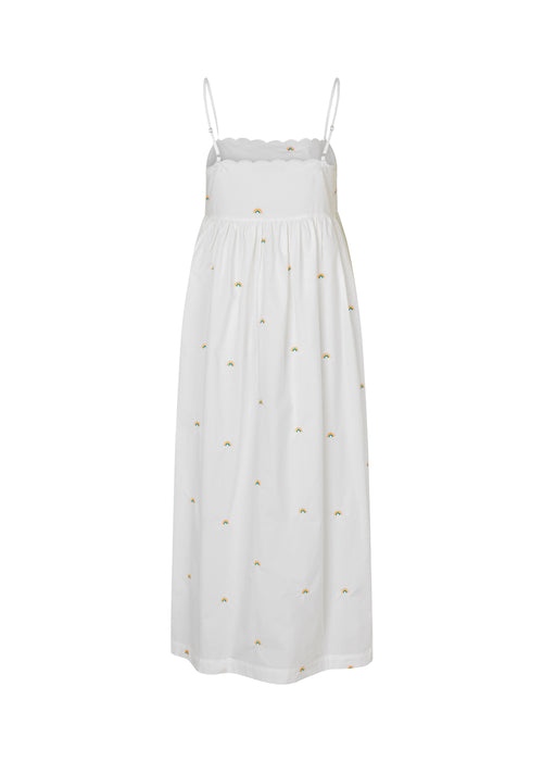 Airy sleeveless dress in organic cotton. PernilleMD strap dress has small, adjustable straps, a more form-fitted bust, and a voluminous, softly draped skirt.