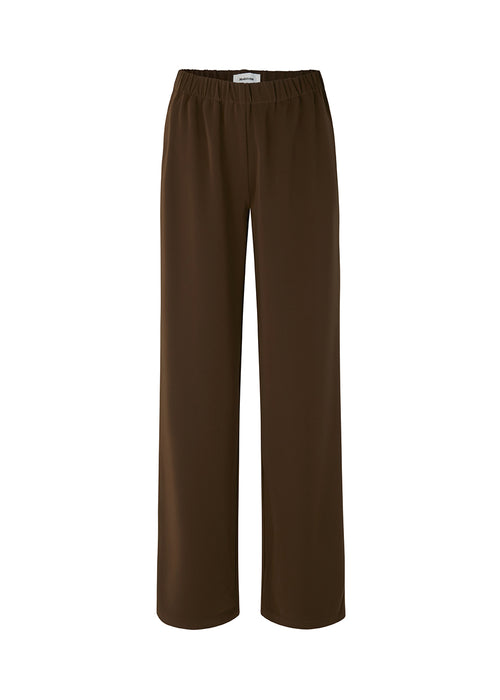 Pants in dark brown in a simple design with wide legs. Perry pants have pockets at side seam and an elasticated waistline for a comfortable fit. The model is 173 cm and wears a size S/36
