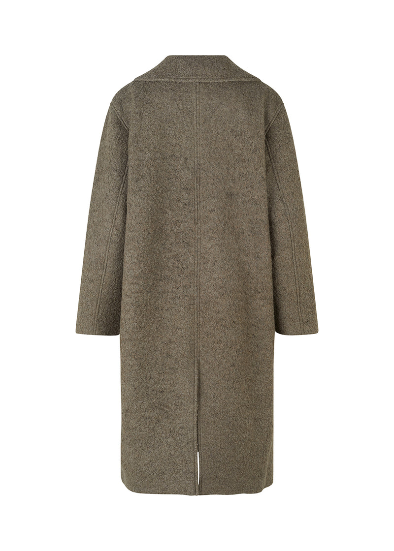 Coat in a soft wool material in brown with a relaxed fit and long, voluminous sleeves. SallieMD coat is calf-length, and has a collar and notch lapels with buttons down the front. Side pockets and single back vent. Lined.