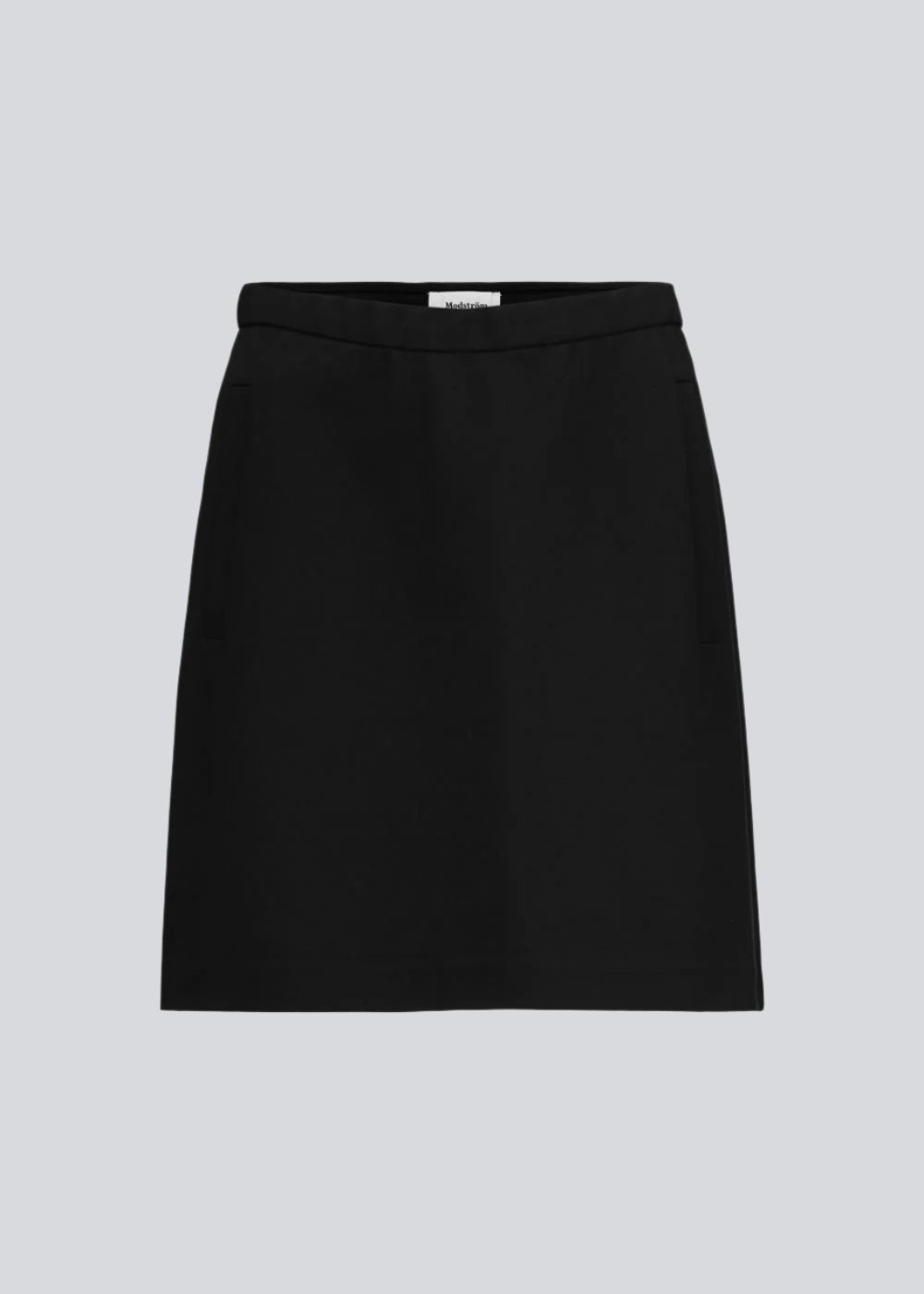Simple and a must-have stylish A-shaped skirt. Tanny short skirt has elastic at the waist and the strechable material creates the perfect fit.