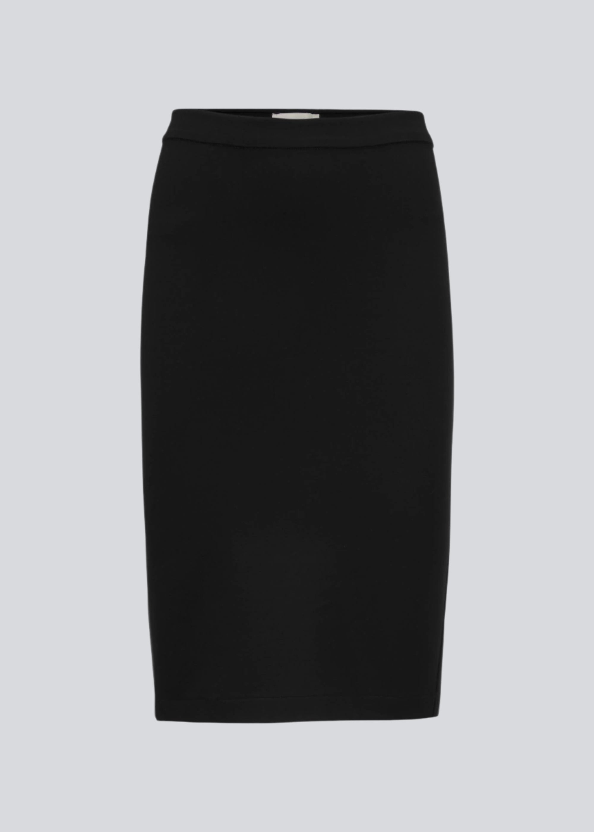 Simple, stylish and a must-have tight skirt. Tanny skirt is knee length and has a small slit at the back. The stretchable material creates a perfect fit. The model is 174 cm and wears a size S/36