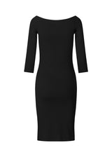 Tansy dress is an off shoulder dress with narrow sleeves. The dress has a clean look and a slim fit. Tansy dress is a knee lenght dress and a basic must-have style in your waredrobe.