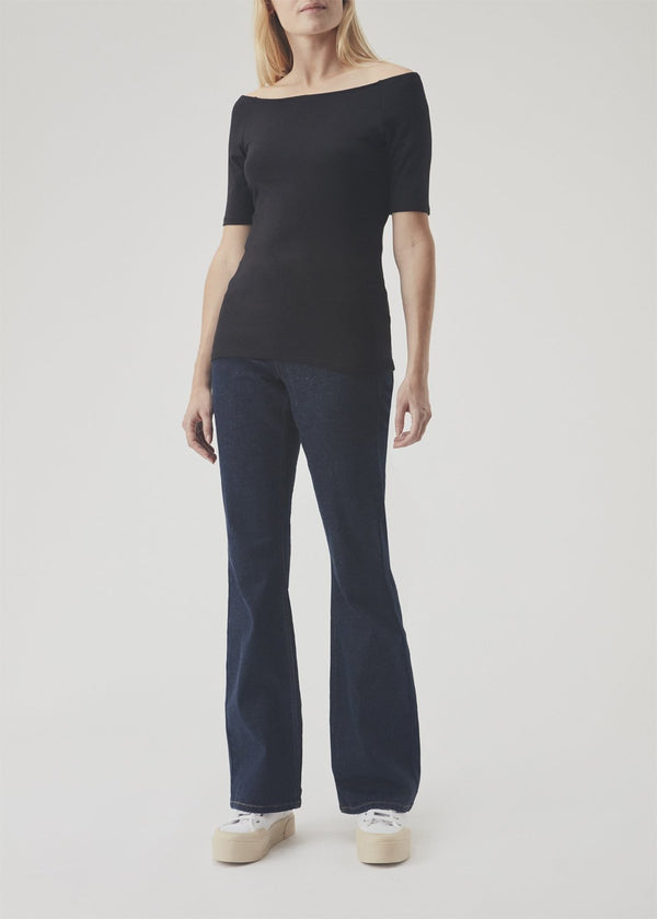 Tansy top has a simple look with a wide neckline at front and back and narrow sleeves. The top is slim fit without being tight. A basic must-have style in your waredrobe.