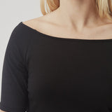 Tansy top has a simple look with a wide neckline at front and back and narrow sleeves. The top is slim fit without being tight. A basic must-have style in your waredrobe.