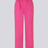 Pants in organic cotton with straight, wide legs. TapirMD pants have a high, elasticated waist, slanted side pockets, and a decorative paspoil back pocket.  Material: 100% Organic Cotton