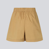 Shorts in a light, organic cotton poplin. TapirMD shorts have a high waist with elasticated waistband and short, wide legs. Pockets at side seam and a short slit at sides.  Material: 100% Organic Cotton