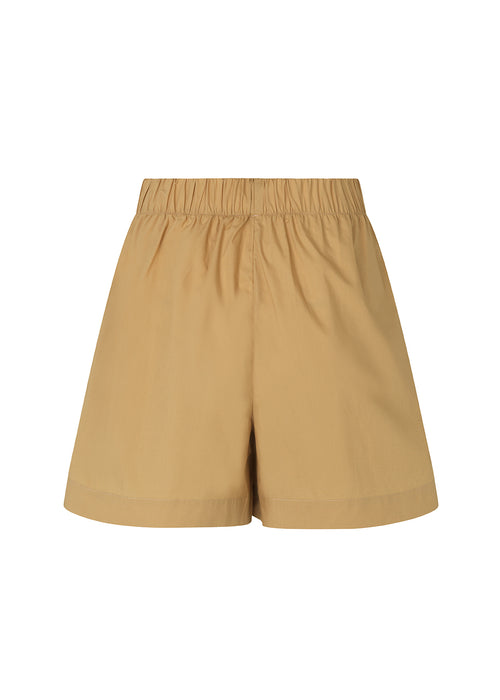 Shorts in a light, organic cotton poplin. TapirMD shorts have a high waist with elasticated waistband and short, wide legs. Pockets at side seam and a short slit at sides.  Material: 100% Organic Cotton
