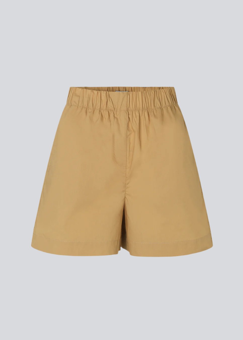 Shorts in a light, organic cotton poplin. TapirMD shorts have a high waist with elasticated waistband and short, wide legs. Pockets at side seam and a short slit at sides.  Material: 100% Organic Cotton