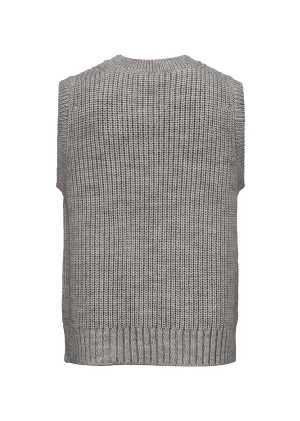 Cool and classic knitted vest with structure. Timme vest has rib edge at neck and bottom and has a loose fit. Style the vest over a t-shirt or a dress for a feminine look.