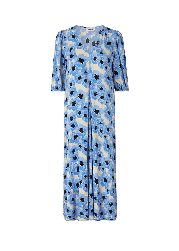 Dress in midi length with elastic puff sleeves cut at elbow length. TorahMD print dress has a v-shaped neckline and box pleat in front for an airy skirt.