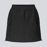Short skirt in nylon with elastic waist and adjustable hems with elastic drawstrings. TrentMD skirt has two patch pockets and vertical cutlines on front and back.