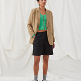 Cargo shorts in black in nylon with wide legs. DilaraMD shorts have an elasticated waistband and two large patch pockets on the sides. The model is 177 cm and wears a size S/36.